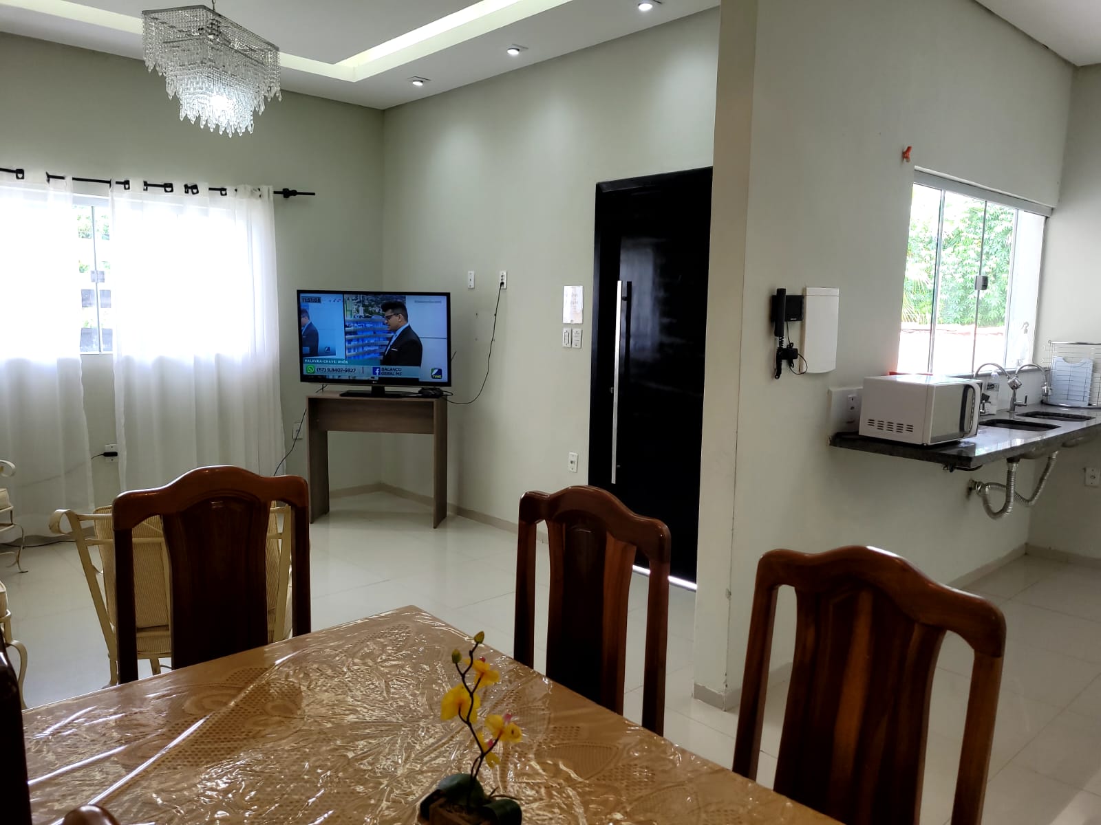 Área de refeições de uma Casa Village