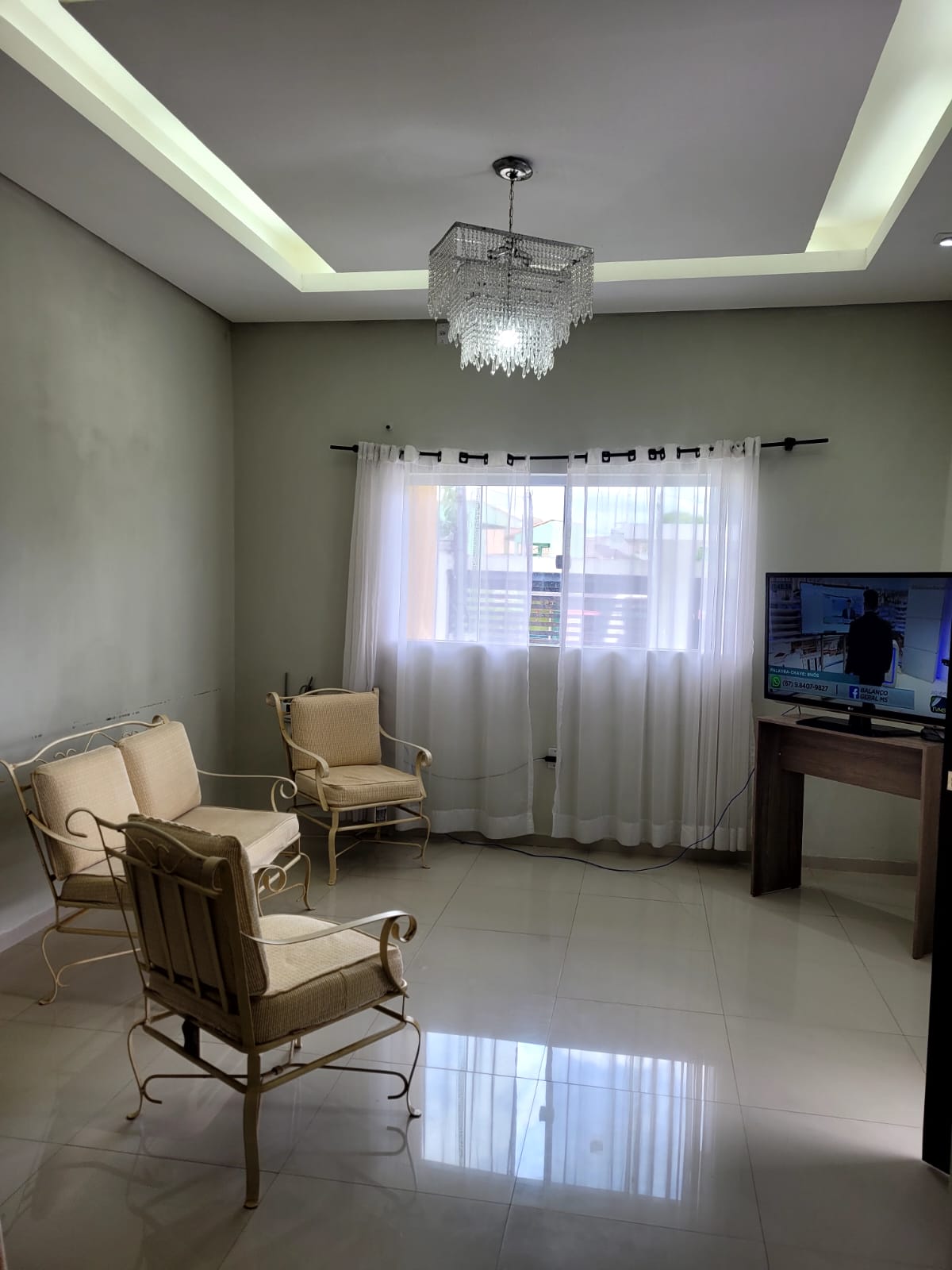 Sala de uma Casa Village